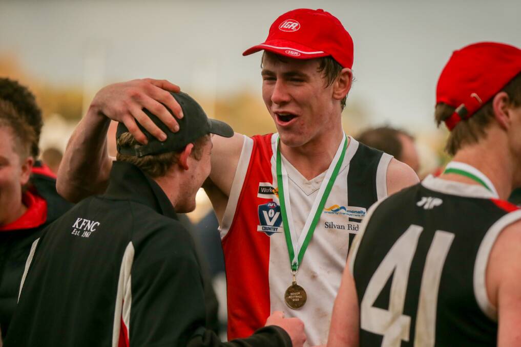 Tom Baulch celebrates Koroit's flag triumph against North Warrnambool Eagles. Picture by Chris Doheny 