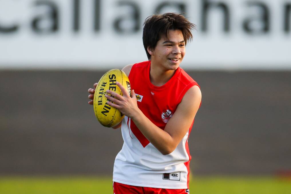 ENJOYMENT: Harry Annett smiles during a training drill at South Warrnambool's under 16 session on Thursday. Picture: Morgan Hancock 