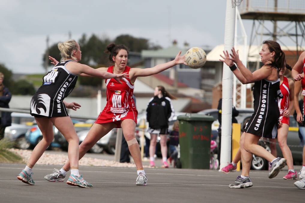 HERE IF YOU NEED: Tracey Baker (right) in action for Camperdown during a 2014 match. 