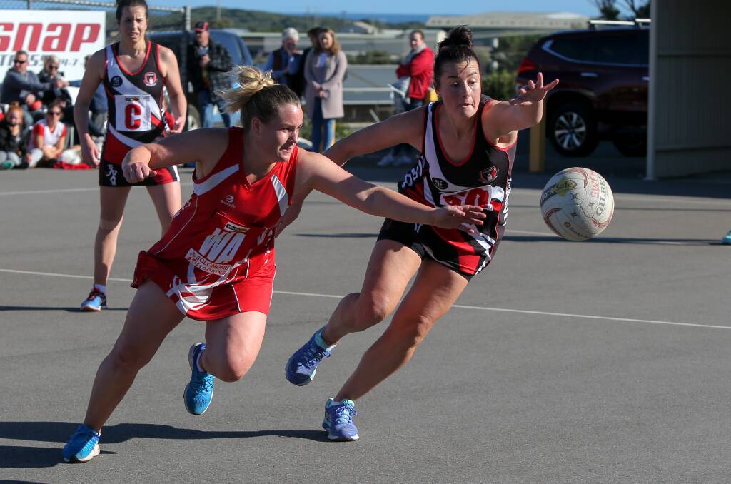 STRETCH: South Warrnambool coach Mandy van Rooy, who played with Titmus at Panmure, opposed to Koroit's Jess O'Connor during a Hampden league match.