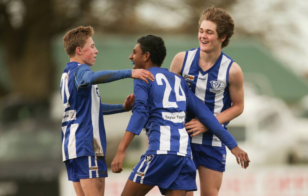 ROO BEAUTY: Hamilton Kangaroos celebrate their extra time under 16 semi-final win against Port Fairy on Sunday. They will face South Warrnambool in the grand final. Picture: Chris Doheny 