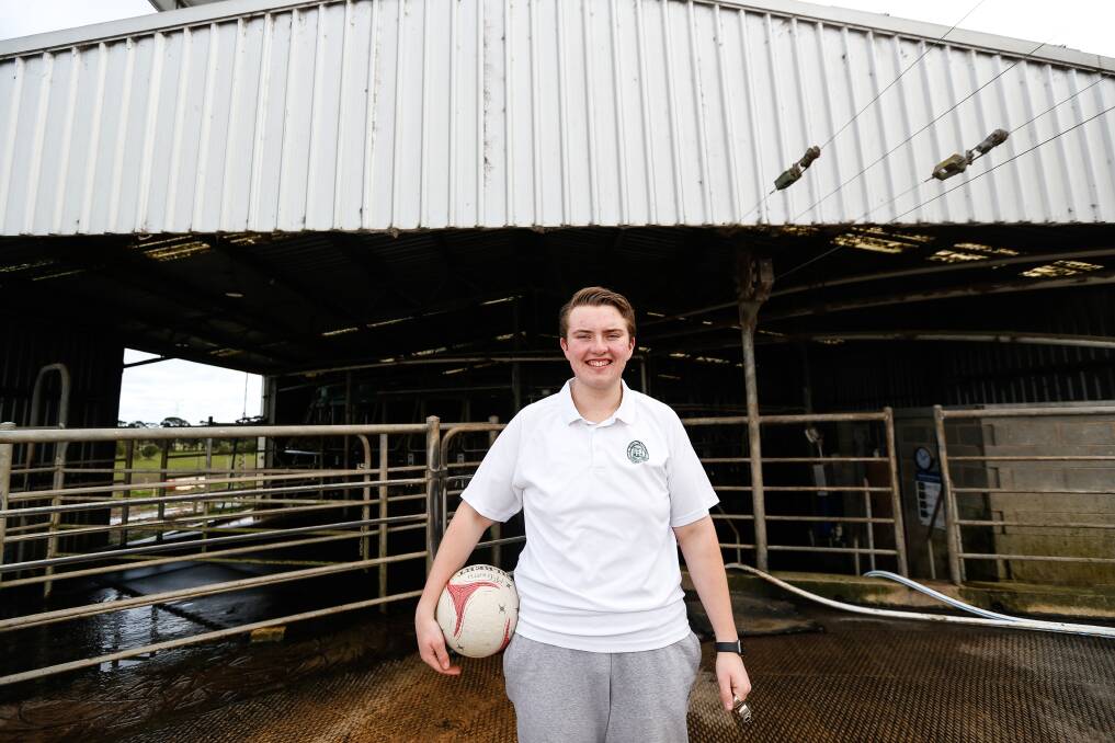 WORK AND PLAY: Leo McGrath on his family's dairy farm at Orford. He umpires netball in his spare time. Picture: Anthony Brady