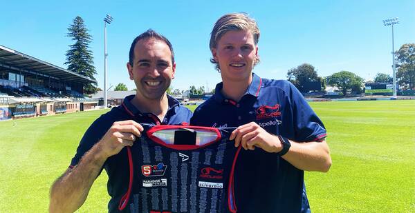 WELCOME ABOARD: Redlegs football operations manager Rob Harding with new recruit Jay Rantall. Picture: Norwood Football Club