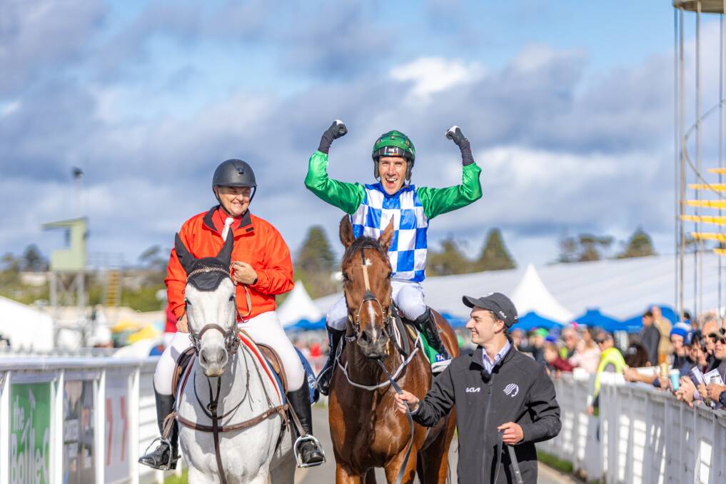 William McCarthy celebrates as Stern Idol returns to the mounting yard a Brierly Steeplechase winner. Picture by Eddie Guerrero