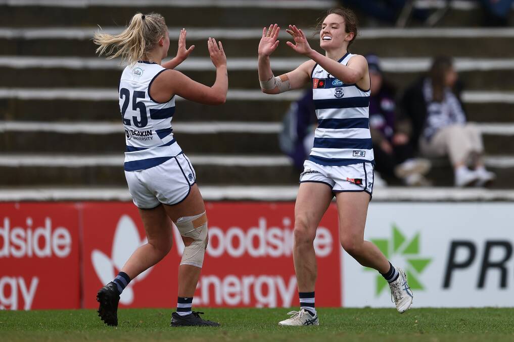 Georgia Clarke (right) during her career at Geelong. She has now joined Essendon. Picture by Getty Images 