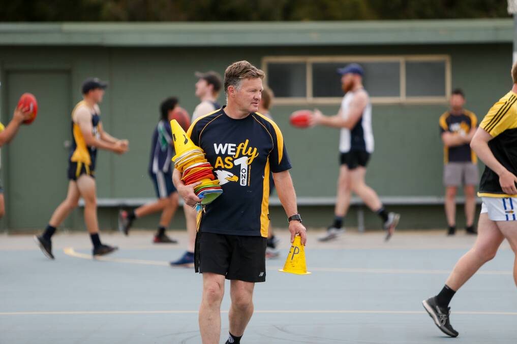 HARD AT WORK: Adam Dowie sets up drills during North Warrnambool Eagles' pre-season training. Picture: Anthony Brady 