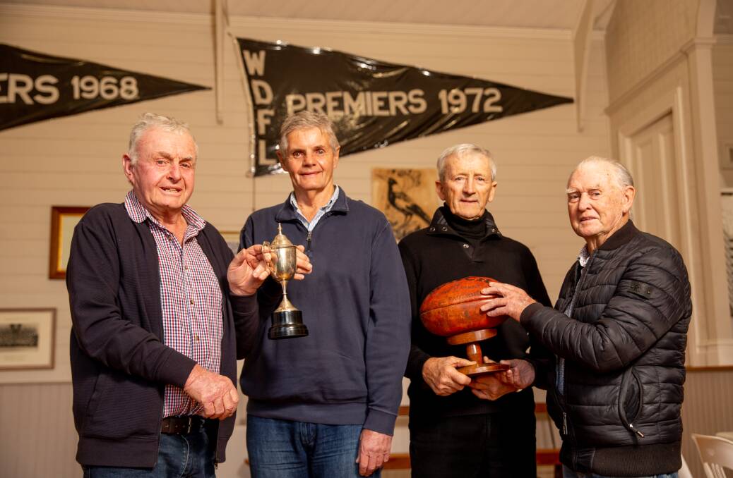 50 YEARS ON: Sam McCosh, Bob McCosh, Basil Ryan and Leo Dunne reminisce about Grassmere's 1972 premiership. Picture: Chris Doheny 
