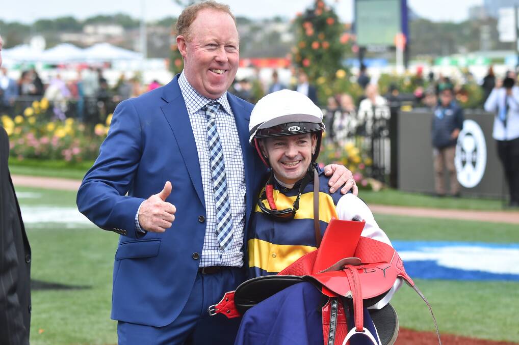 Matthew Williams and Dean Yendall after Toregene won at Flemington on Thursday. Picture by Reg Ryan/Racing Photos 