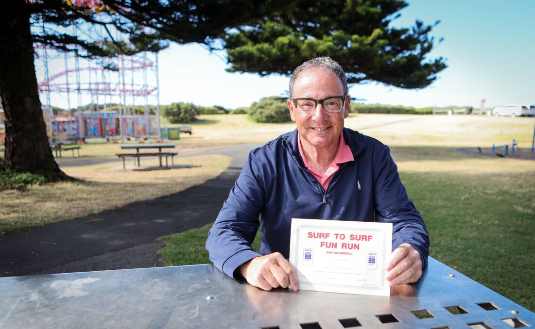 Alan McDowell with the first Surf 'T' Surf certificate he received in 1982. He will run in the 2023 edition on Sunday. Picture by Anthony Brady