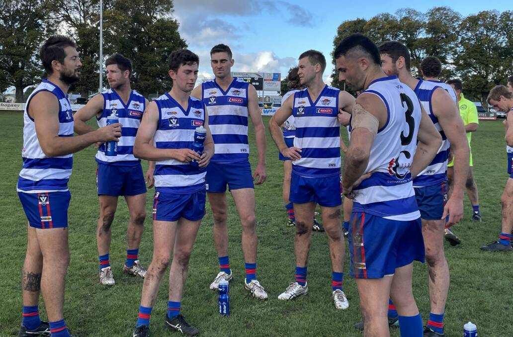 LISTEN UP: Terang Mortlake players speaking at quarter-time against Port Fairy. Picture: Justine McCullagh-Beasy 