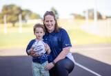 New Warrnambool coach Kate Lindsey and son Billy at Reid Oval. Picture by Sean McKenna 
