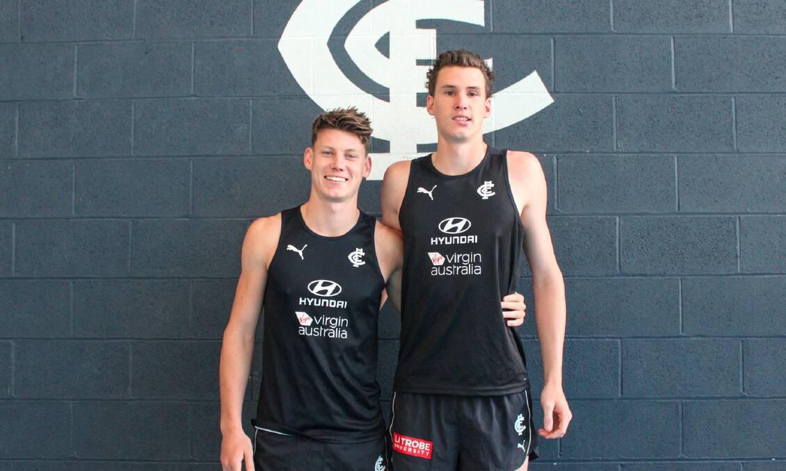 BROTHERS IN ARMS: The Walsh brothers, Sam and Henry, at Carlton last year during the younger sibling's AFL Academy visit. Picture: Cristian Filippo 