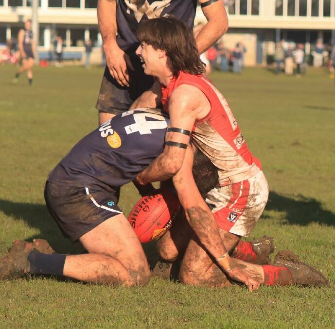 GOT HIM: South Warrnambool's Fraser Marris, who was best on ground, lays a tackle. Picture: George El-Hage
