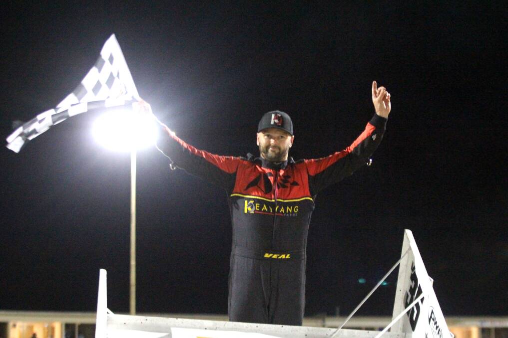 Warrnambool driver Jamie Veal celebrates a victory at Allansford's Premier Speedway on Saturday, November 18. Picture by Meg Saultry 