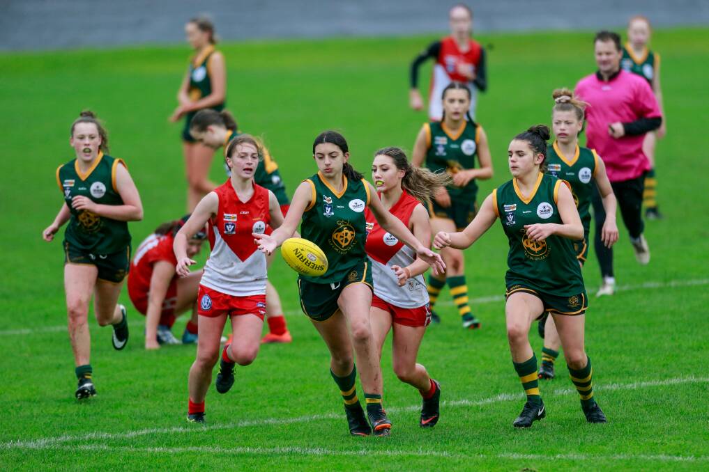 KICKING GOALS: Old Collegians' Teneale Anders plays against South Warrnambool in the Western Victoria Female Football League under 18 girls competition last year. Picture: Anthony Brady