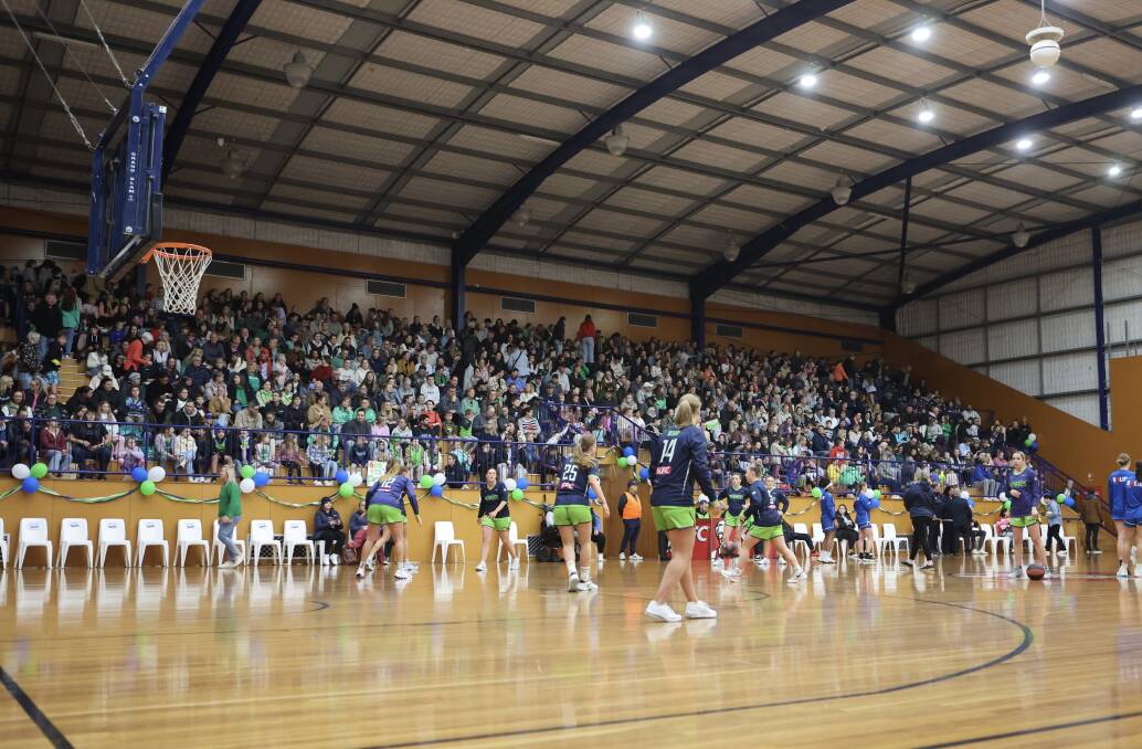 Warrnambool Mermaids warm up in front of a packed house. Picture by Anthony Brady 