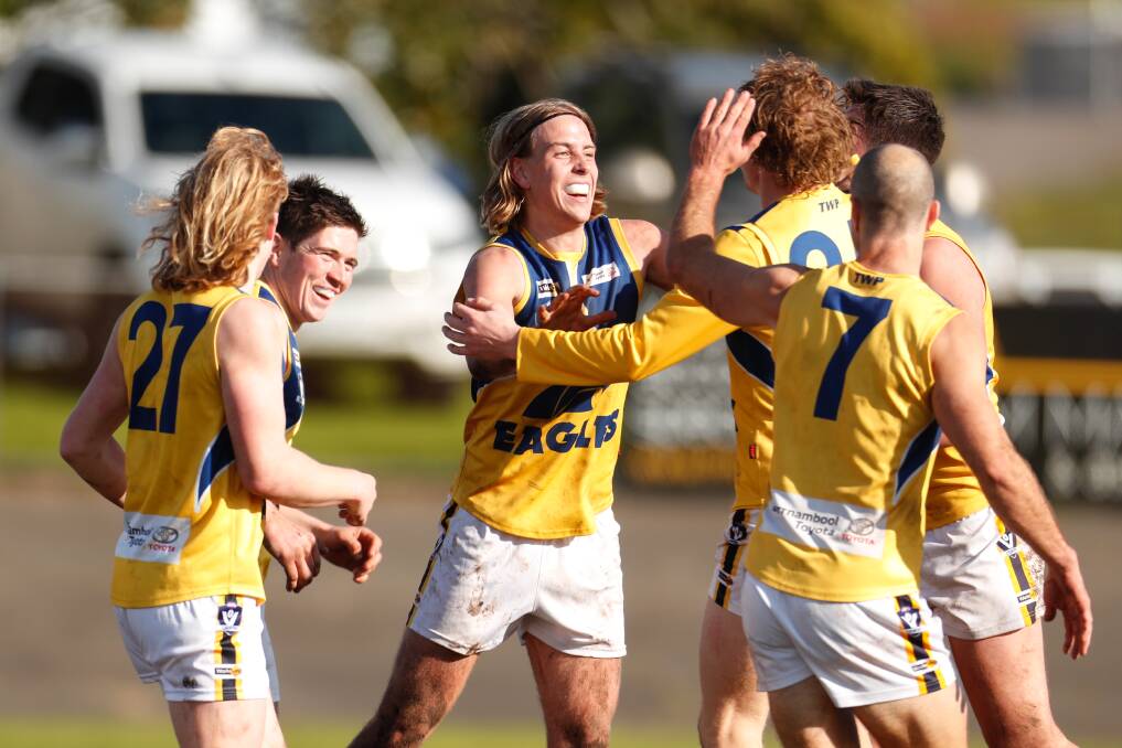 IMPORTANT: Jett Bermingham (centre) celebrates a goal for North Warrnambool Eagles this season. Picture: Chris Doheny 