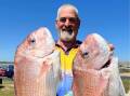 Peter Goode with a couple of solid snapper off Warrnambool. Pictures supplied 