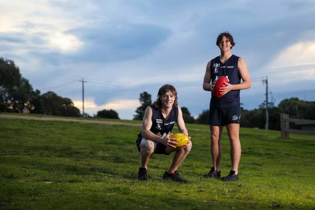 WAITING PATIENTLY: Warrnambool footballers Reggie Mast and Amon Radley can't wait to play with their under 16 teammates again. Picture: Morgan Hancock 