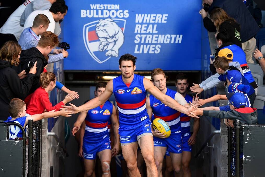 HIGH FIVES: Western Bulldogs premiership captain Easton Wood has always been generous to fans. Picture: Adam Trafford