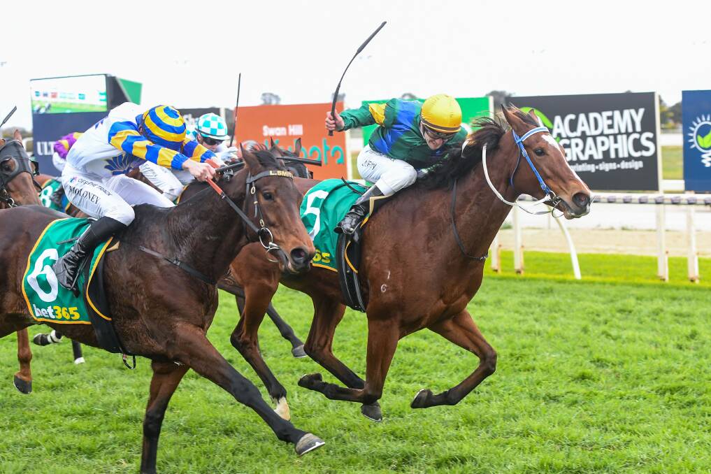 SUCCESS: Paul's Regret, ridden by Jarrod Fry, wins the Swan Hill Cup on Sunday. Picture: Brett Holburt/Racing Photos 