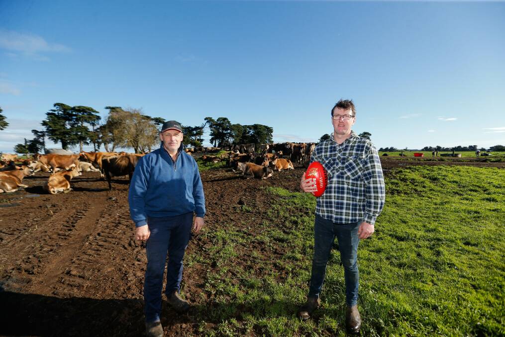 ON THE LAND: Shane Quick, 53, and Adam Courtney, 40, milk 300 cows at a Glenormiston dairy farm. Picture: Anthony Brady 