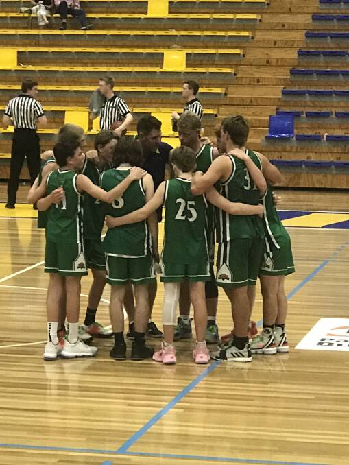 WORDS OF WISDOM: Warrnambool Seahawks under 16 coach Shane Smith addresses his players during the Vic Country basketball championships in Bendigo.