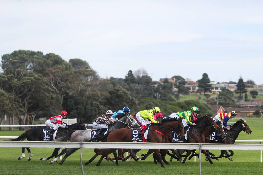 OFF AND RACING: The field starts the BM170 handicap over 1400 metres. Picture: Morgan Hancock 