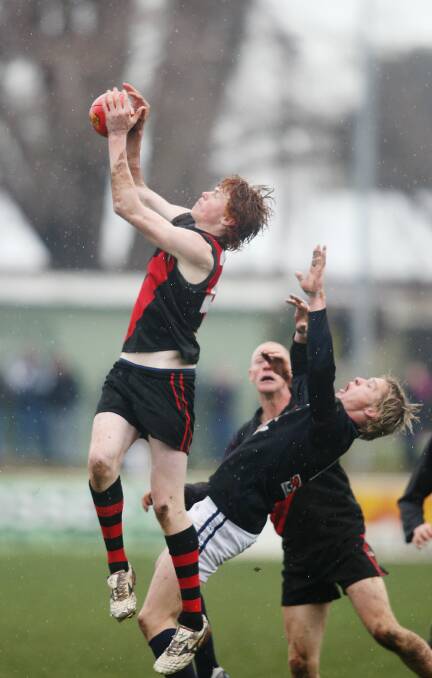 LEARNING CURVE: Cobden's Gary Rohan takes a mark in front of Warrnambool's Jason Rowan during a Hampden league senior game in 2008.