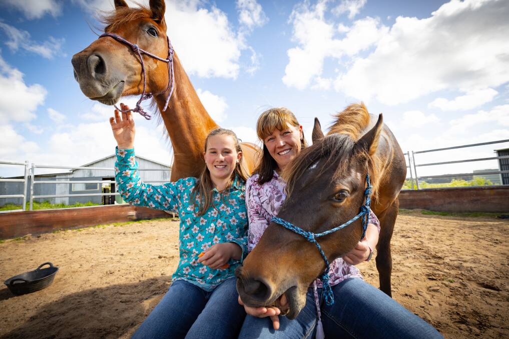 Asha Loughnan, 12, with Dawn and Carly Loughnan with Pirate at their Timboon property. Picture by Sean McKenna 