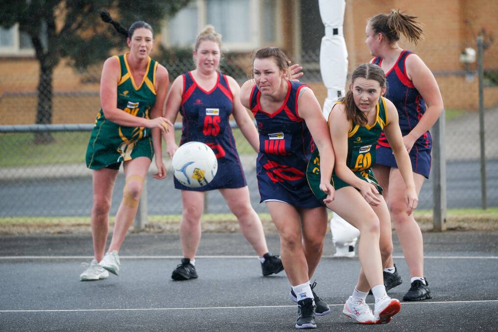 COLLISION: Timboon Demons' Tanya McKenzie and Old Collegians' Lauren Vaswer vie for possession of the ball on Saturday. Pictures: Anthony Brady 