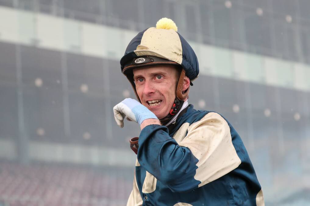 SPECIAL MOMENT: Daniel Moor after his win at Caulfield racecourse on Saturday. Picture: Racing Photos 