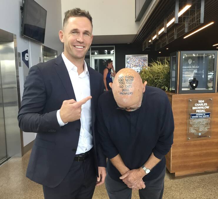 Geelong premiership captain Joel Selwood with passionate Cats supporter Lochie Keats and his head tattoo. Picture supplied 