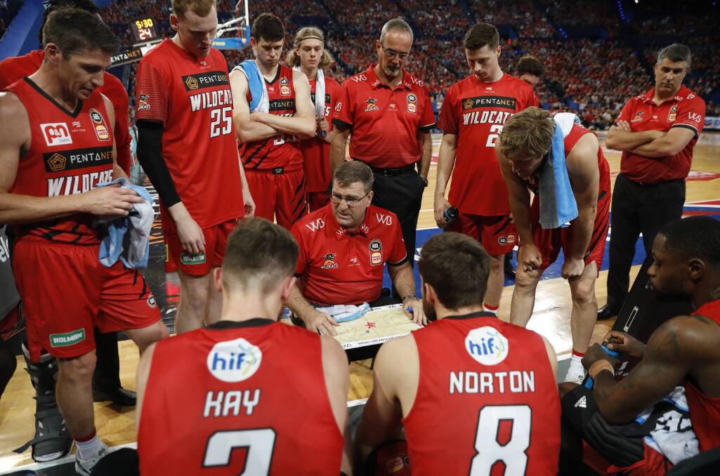 LEADER OF THE PACK: Coach Trevor Gleeson addresses his players during the NBL season. Picture: Perth Wildcats 