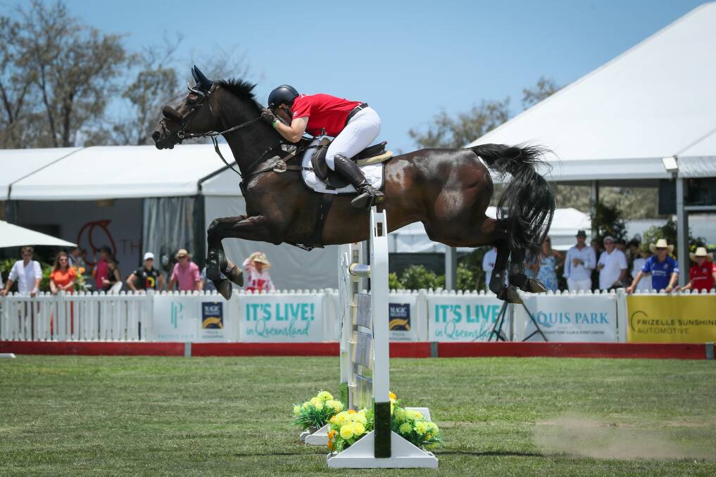 Katie Hope and Oaks Gunn enjoy some airtime at the Magic Millions' showjumping competition. Picture by Michelle Terlato Photography 