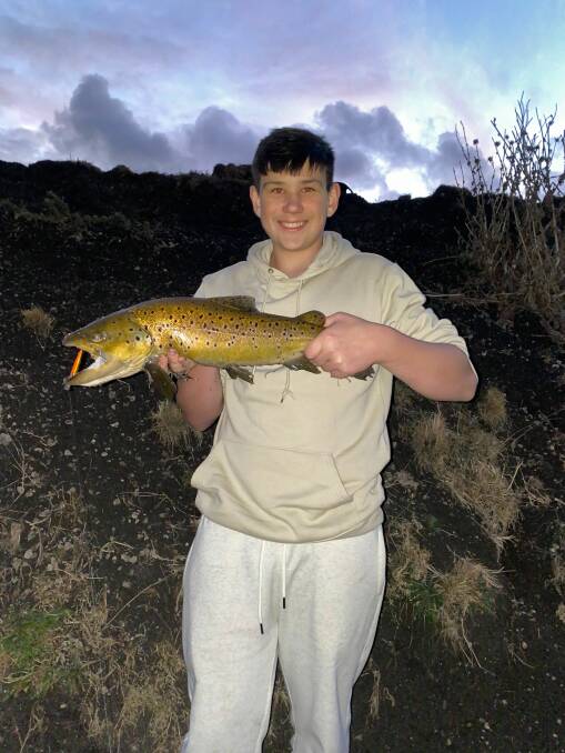 Austin Walpole with a nice trout. Picture supplied 