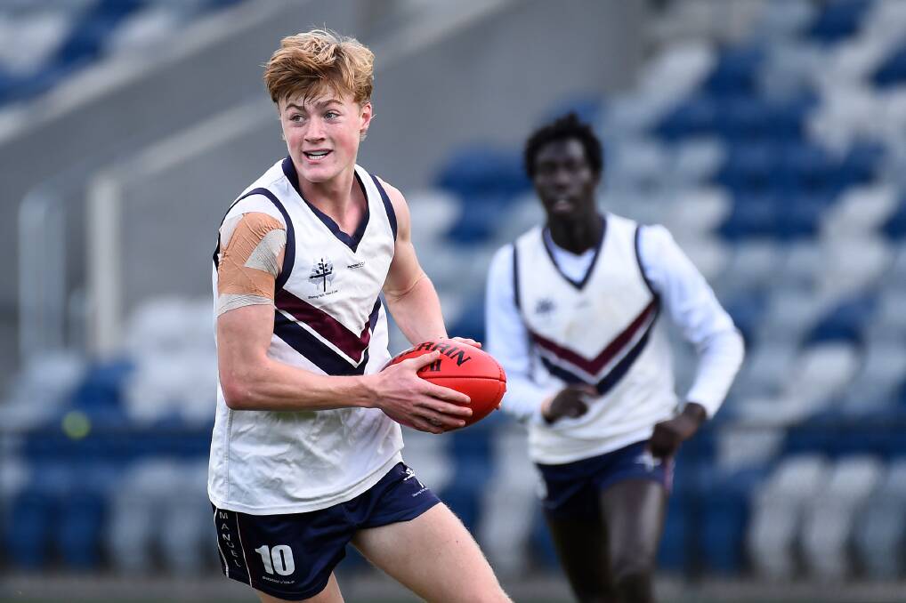 GAME DAY: Jamie Lloyd in action for Emmanuel College during the School Sport Victoria premier boys' grand final in Ballarat. The win earned the school an invite to the Herald Sun Shield. Picture: Adam Trafford 