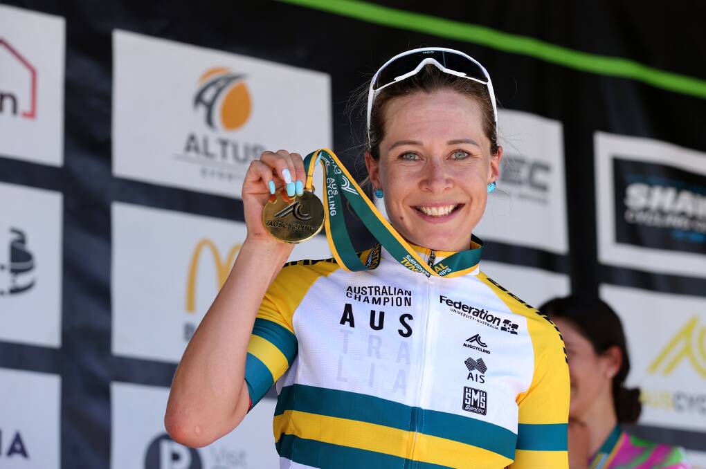NUMBER ONE: Nicole Frain shows off the spoils after winning the AusCycling road nationals in Ballarat. Picture: Getty Images 