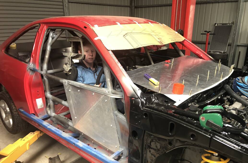ON THE TOOLS: Jayden Lock has helped build his junior sedan from the ground up.