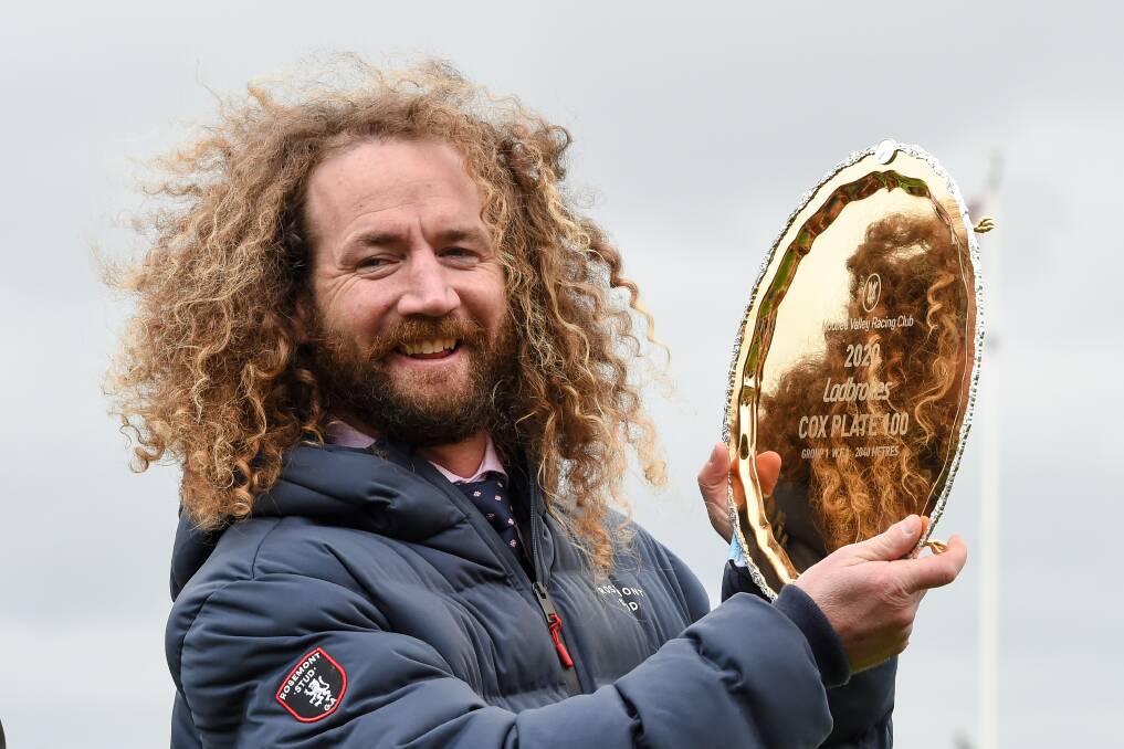 NUMBER ONE: Ciaron Maher with the 2020 Cox Plate spoils. Picture: Brett Holburt/Racing Photos 