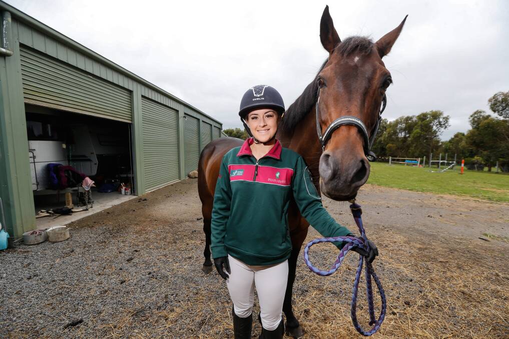 WINNING DUO: Emily Manuell and her horse Neapolian at their Mailors Flat property. Picture: Anthony Brady