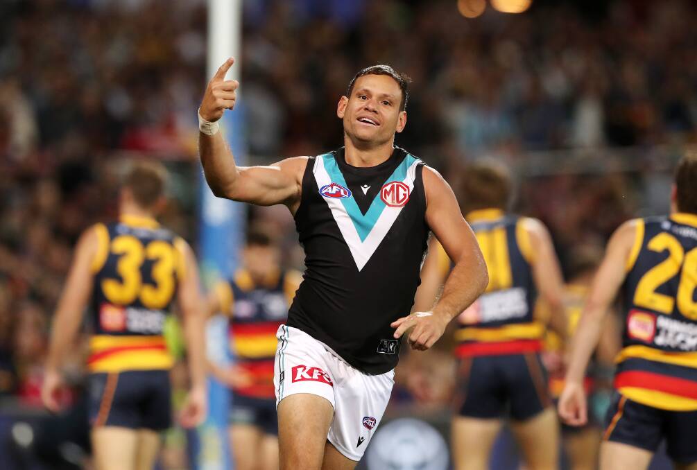 Steven Motlop celebrates a goal for Port Adelaide during his AFL career. Picture by Getty Images 