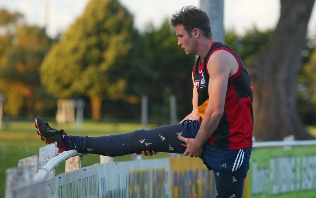 STRETCH: Frank Matthews during a Port Fairy training session at Gardens Oval in 2005. 