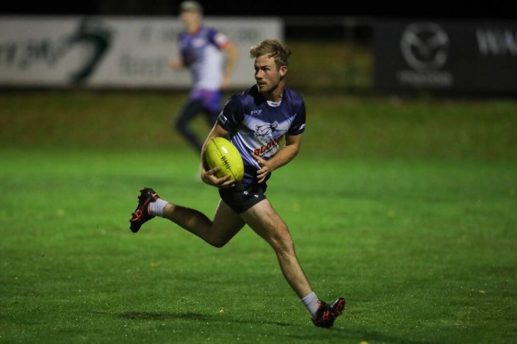 HARD WORK: Brodhi Carracher in action at Terang Mortlake training on Thursday night. Picture: Morgan Hancock 