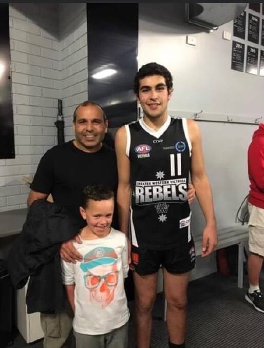 Josh Chatfield with dad Joey and brother Harry after a GWV Rebels game. Picture supplied 