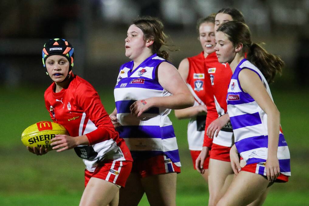 FRIDAY NIGHT LIGHTS: South Warrnambool's Hannah Rooke plays against Terang Mortlake in the final round. Picture: Morgan Hancock 
