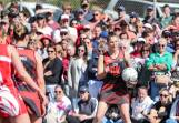 A large crowd watches Cobden's Remeny McCann in action during the Hampden open netball grand final. Picture by Anthony Brady 