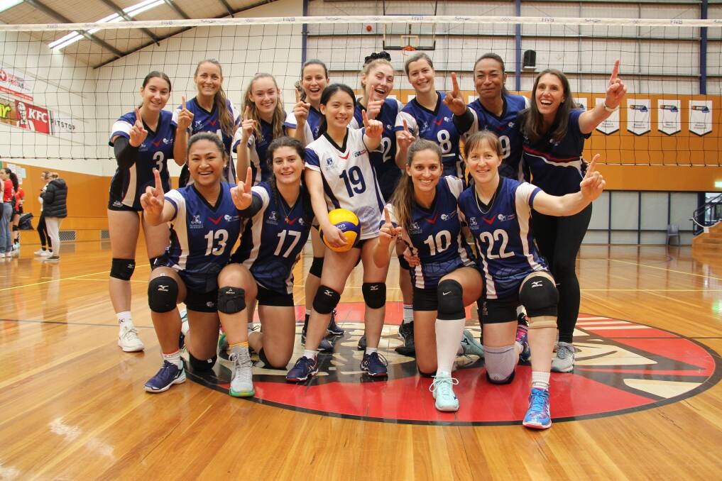 WE'RE NUMBER ONE: Melbourne University Renegades celebrate their Warrnambool Seaside Volleyball Tournament success after winning the women's honours final. Picture: Nick Ansell