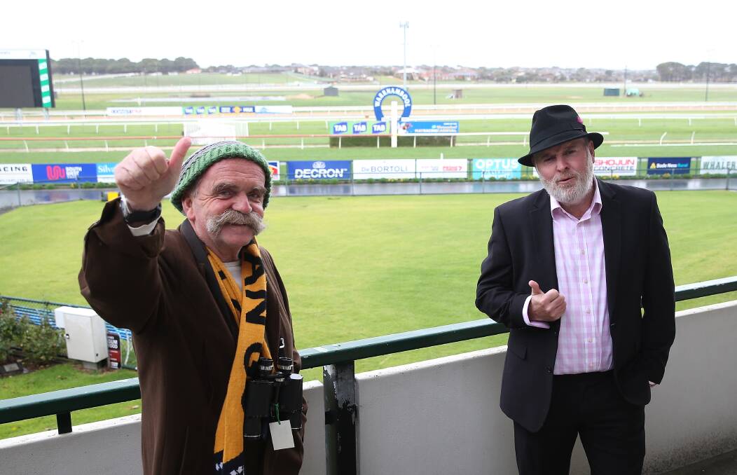 DYNAMIC DUO: The Standard's Tim Auld and Andrew Thomson place their day two bets. Picture: Mark Witte 