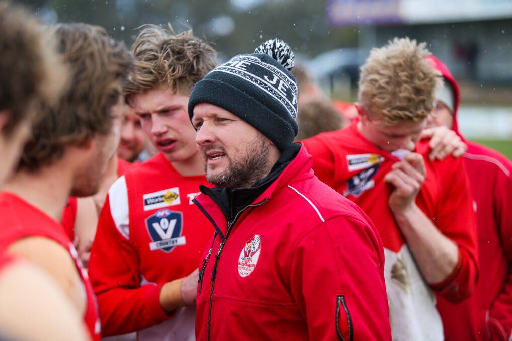 LEARNING CURVE: Mat Buck spent three seasons at South Warrnambool as senior coach, from 2015 to 2018. He coached players such as Jay Rantall (background, left) who is now at AFL club Collingwood. 
